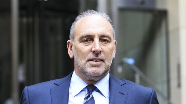 Brian Houston from Hillsong Church leaves the royal commission in Sydney in 2014.