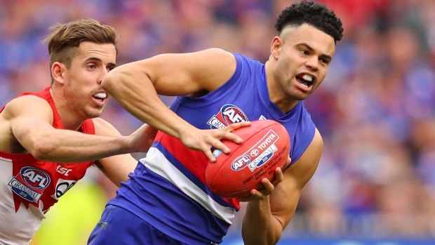 The agent who secured Jason Johannisen's future at the Western Bulldogs is embroiled in a legal stoush. 