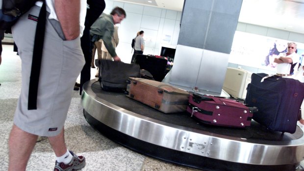 Qantas has come under fire for outsourcing its baggage handling services during the pandemic. 
