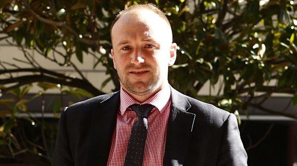 Phillip Hughes' brother Jason arrives at the inquest on Friday.