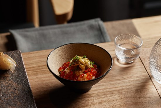 Salmon roe and sea urchin chirashi zushi is an example of what diners may eat during Aoi Tsuki's omakase.