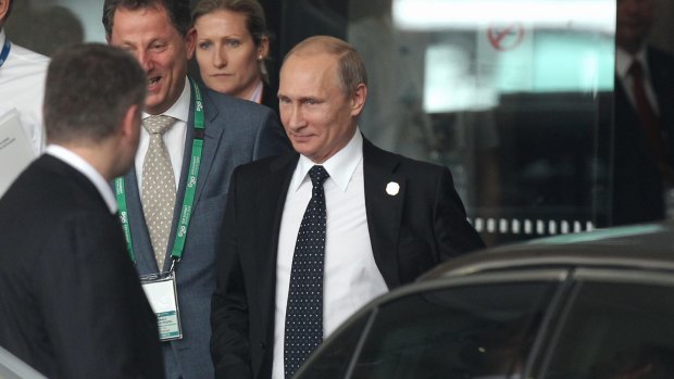 Early departure: Vladimir Putin heads back to Russia. 