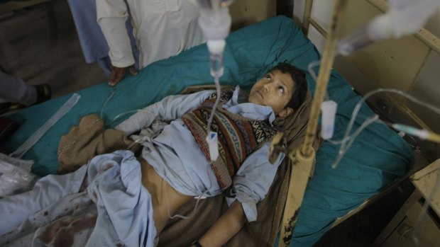 A child injured in the blast is treated at a local hospital in Mardan.