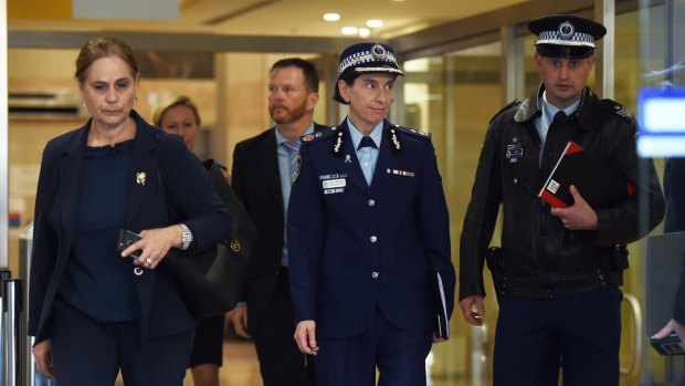 NSW Police Deputy Commissioner Catherine Burn, centre, leaves after giving evidence at the Lindt cafe siege inquest on Tuesday.