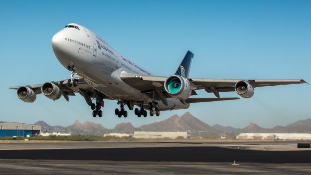 The Ultrafan engine dwarfs the regular engines on a testbed Boeing 747.