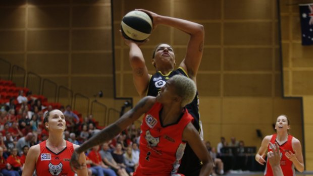 On the up: Melbourne Boomers star Liz Cambage goes to the basket against Perth on Friday night.