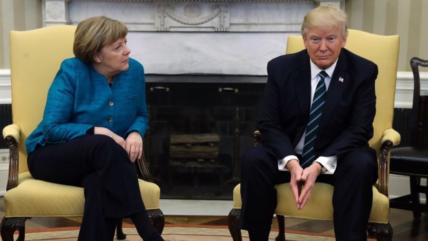 US President Donald Trump had an awkward first meeting with German Chancellor Angela Merkel.