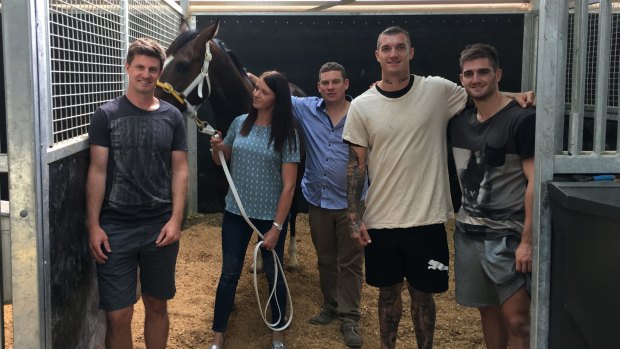Team bonding: Andrew McQualter, Natalie Young (trainer), Trent Busuttin (trainer), Dustin Martin and Anthony Miles with Victoria Derby favourite Main Stage.