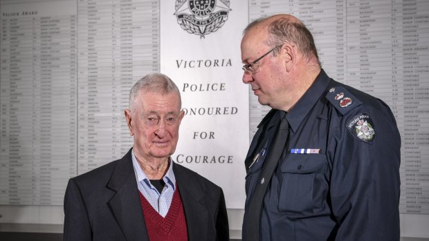 Former policeman Denis Ryan with Chief Commissioner Graham Ashton.