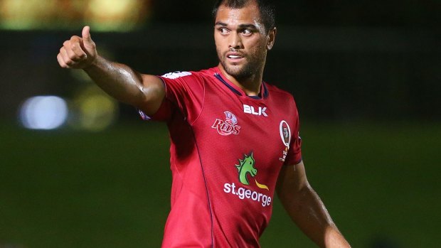 In hot water: Karmichael Hunt of the Reds during last week's trial match against the Rebels.