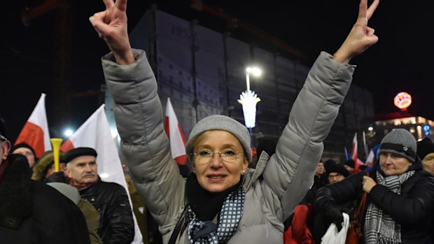 Anti-government protesters on the anniversary of imposition of the 1981 martial law by the country's former communist regime.