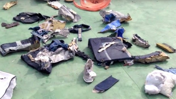 Debris and personal belongings from MS804, including a shoe, which were recovered from the sea.