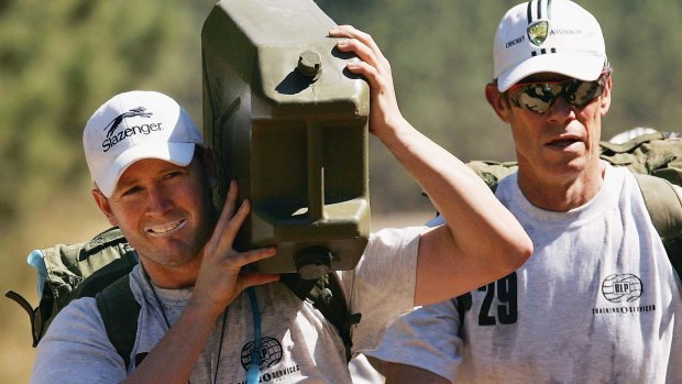 No love lost: Michael Clarke and former coach John Buchanan.