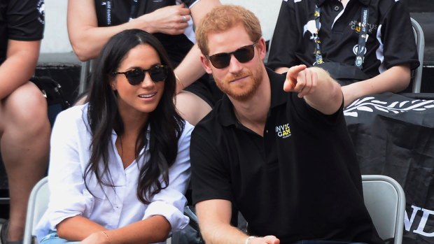 Prince Harry and his girlfriend Meghan Markle attend a wheelchair tennis event at the Invictus Games in Toronto in September.