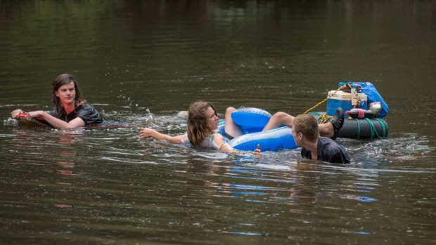 Dylan, Riley, and Jack take a dip in the Yarra River at Warrandyte Bridge.