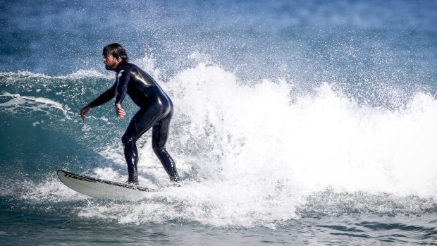 Surfers at Gunnamatta beach were unfazed by the shark attack on Mick Fanning.