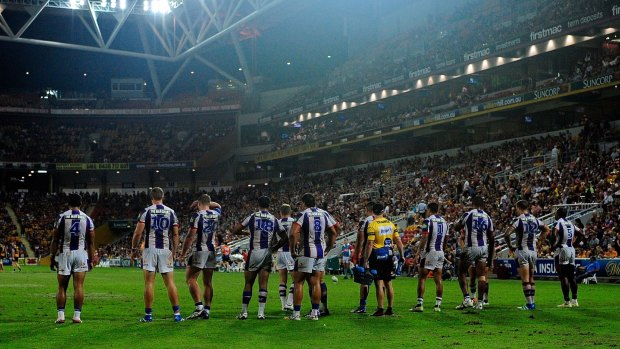 Flogging: The Knights stand in the in-goal area waiting for a conversion attempt during the round seven NRL match against the Brisbane Broncos.