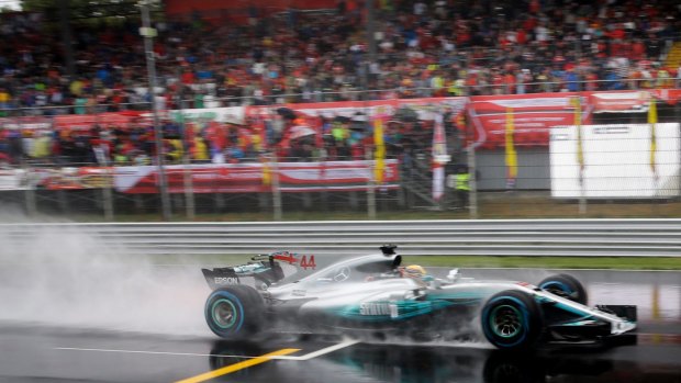 Slip stream: The finish was confirmation of Hamilton's status as the greatest since Ayrton Senna at making a Formula One car dance in the wet.