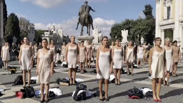 Alitalia's former flight attendants stage a protest in a square atop Rome's Capitoline Hill.
