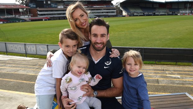 Andrew Walker and his family after announcing his retirement. 