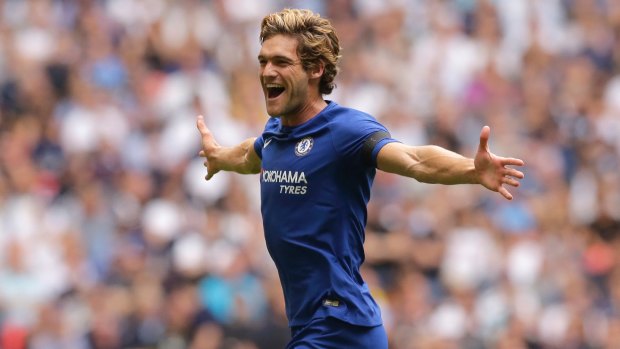 Marcos Alonso celebrates the first of two goals for Chelsea against Tottenham Hotspur at Wembley on Sunday.