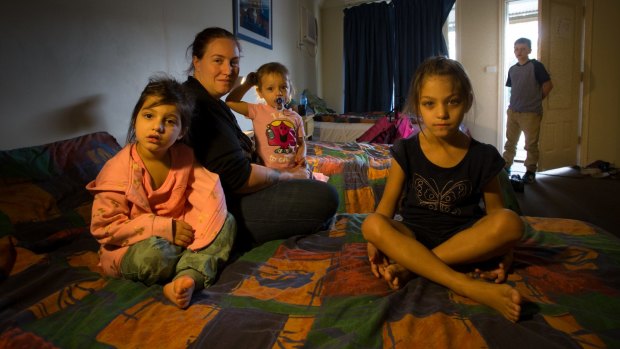 Loretta in the motel room with her four children; Lynkon, 10, (rear) Sienna Rose, 1, Tamyin, 4, (left) and Makeysha, 5. 