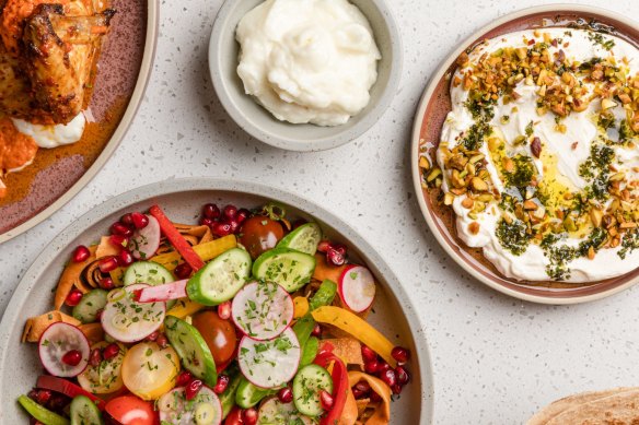 Harissa spatchcock, garlic toum, fattoush salad and labneh with oregano, pistachio and green olives at Zaffi.