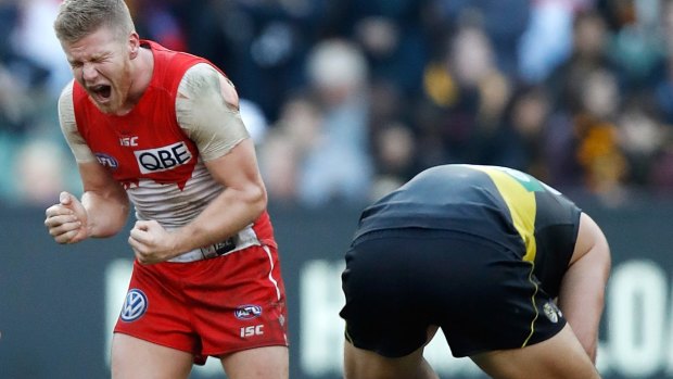 Sydney's Dan Hannebery celebrates as the final siren sounds.