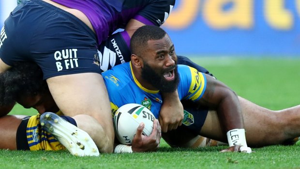 Semi Radradra is brought down by the Storm defence at AAMI Park.