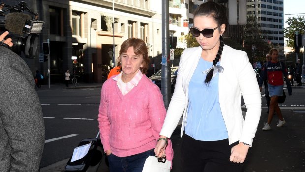 Melissa Higgins, right, arrives at court to be sentenced, accompanied by her mother.