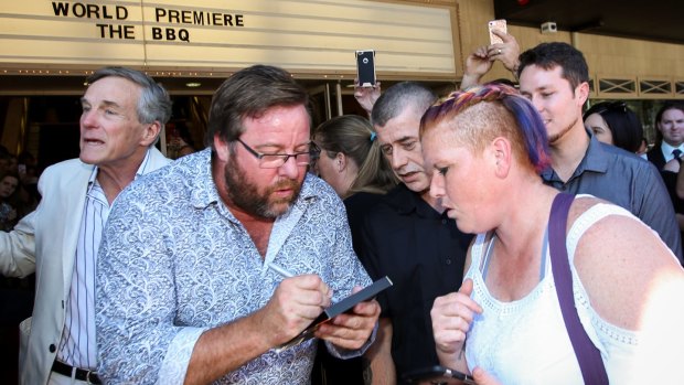 Autograph time for Shane Jacobson.