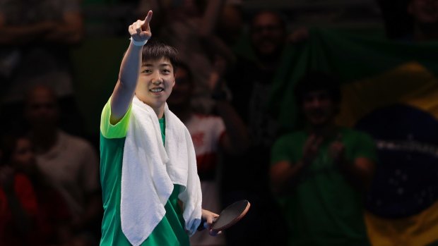 Pointing the way: Gui Lin moved from China to Brazil at age 12.