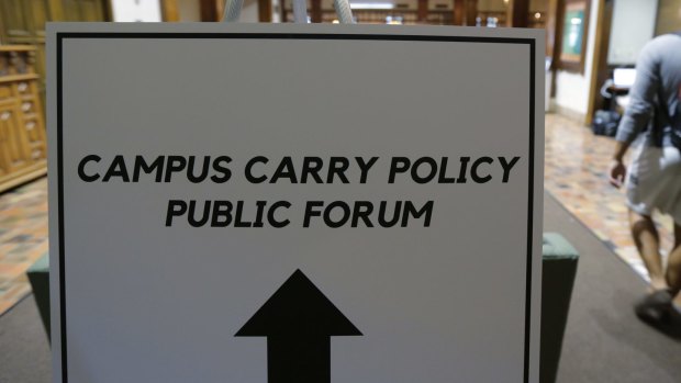 The University of Texas held public forums to discuss how to implement the new "campus carry" law in August.