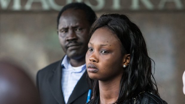 The children's eldest sister, 19-year-old Akoi Chabiet outside court. 
