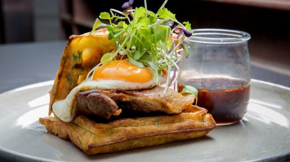 Not just sweet: Savoury waffles with confit duck and fried egg at Code Black in Melbourne.