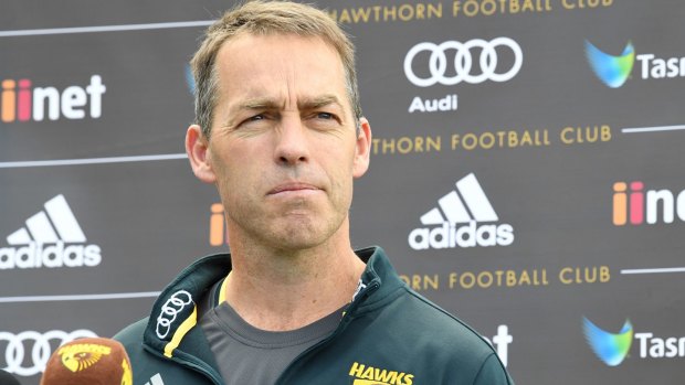 Olive branch: Hawthorn coach Alastair Clarkson would be happy for James Hird to be welcomed back into the AFL fold.