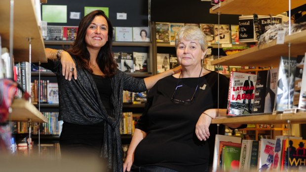 Katarina Pearson, left, and Anne Hutton of the Electric Shadows Bookshop, in Braddon, which is closing down.