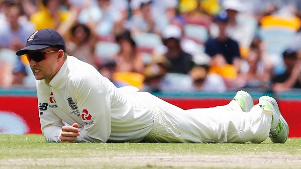 Down for the count: Joe Root looks dejected in the field.