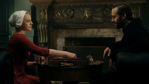 Offred (Elisabeth Moss) and Commander Waterford (Joseph Fiennes) in <i>The Handmaid's Tale</i> 'Birth Day' episode.