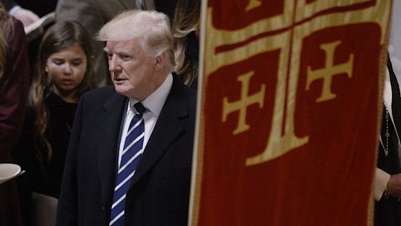 US President Donald Trump attends the National Prayer Service at the National Cathedral in Washington on his first day in office.