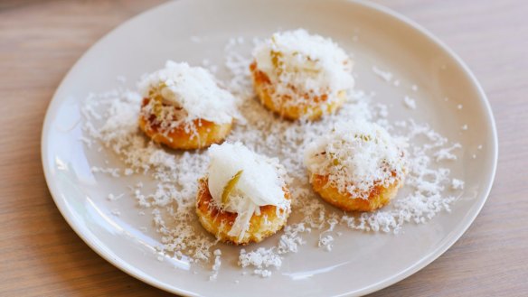 Ricotta and polenta cakes with goat's cheese and pickled fennel.