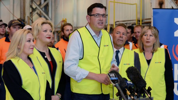 Jill Hennessy (second from left) would be transport minister in a Labor government led by Daniel Andrews (centre).
