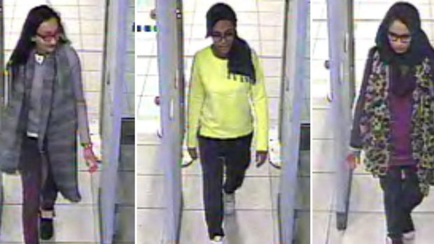 British teenagers, from left, Kadiza Sultana, Amira Abase and Shamima Begum passing through security barriers at Gatwick Airport, south of London, on February 17, 2015.
