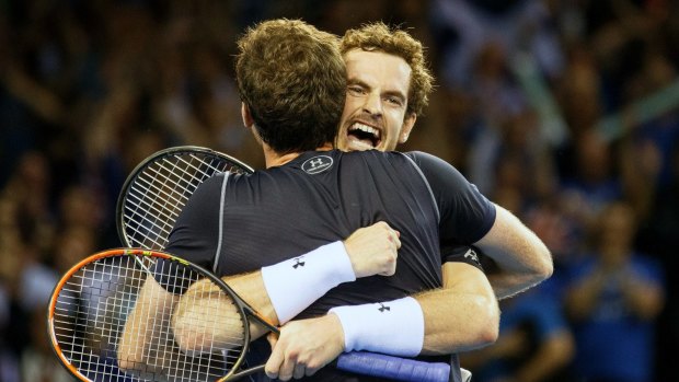 Winners: Andy Murray celebrates with his brother Jamie Murray.