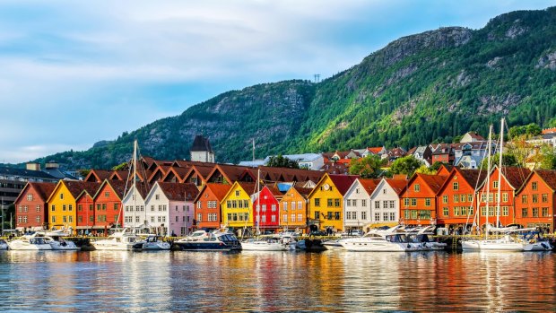 Bergen is the Norway's former medieval capital, whose wharf is lined with cheerful gabled houses.