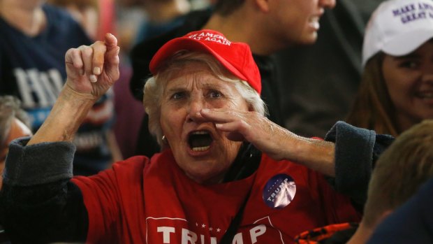 A supporter of Republican presidential candidate Donald Trump berates the media in Colorado.