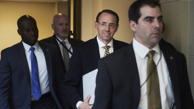 Rod Rosenstein, US deputy attorney-general, centre, arrives for a meeting with the Senate on Thursday.