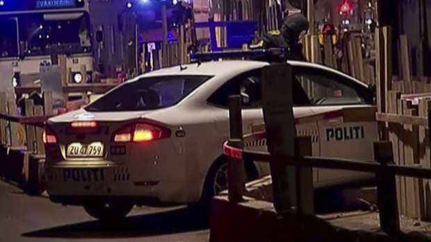 Police near the Copenhagen synagogue where a person was shot dead.