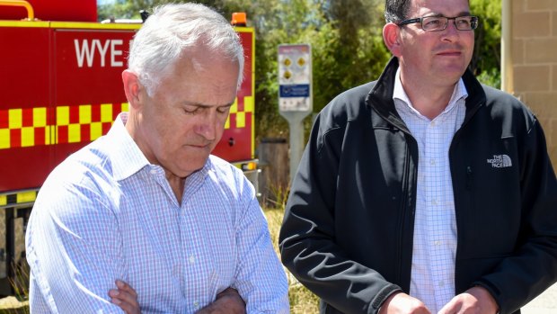 Prime Minister Malcolm Turnbull inspects bushfire damage in Victoria with  Premier Daniel Andrews on Tuesday, shortly before the twin cabinet announcements.