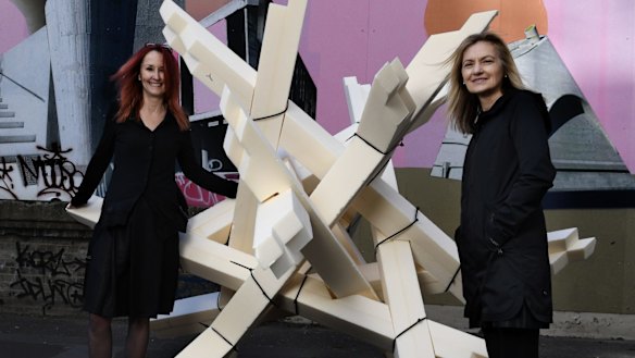 Professors Jill Bennett and Katherine Boydell with a model of the interactive game Catch the Tiger, which will be used to test reactions to changes in environment and fluctuating anxiety levels.